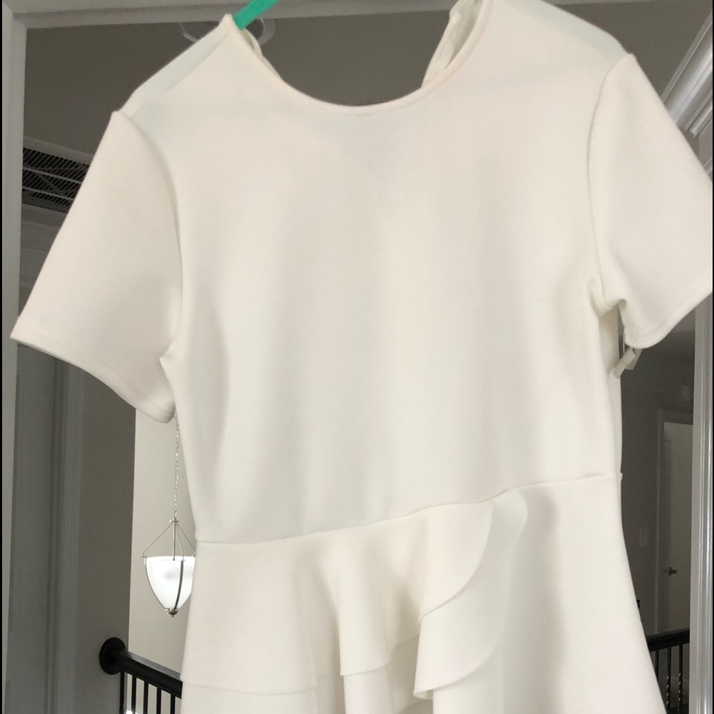 White peplum top